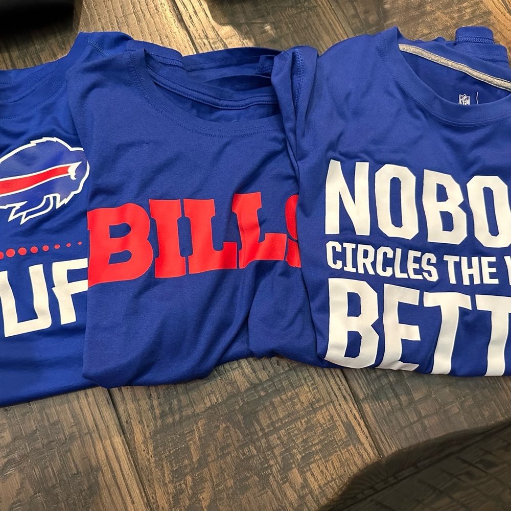 A lot of three Buffalo Bills, Nike and under armor, short sleeve T-shirts